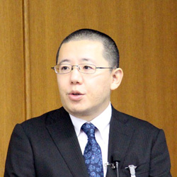 画像：発表の様子（吉田氏）